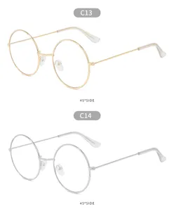 Detail view of round vintage metal frame glasses, 45 degree angle display in gold and silver colors.