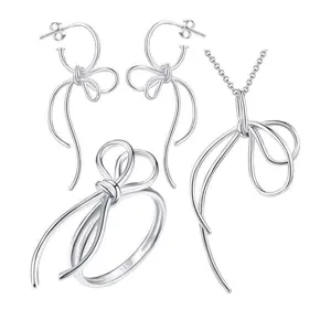 Bijoux nœud papillon en argent S925, collier élégant, bague et boucles d'oreilles tendance.
