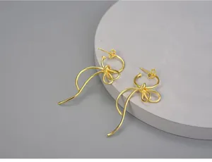 Boucles d'oreilles nœud argent 925 créatives, design linéaire asymétrique bijou.