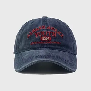 Vintage washed cotton baseball cap with red embroidered letters, curved brim, casual sun hat.