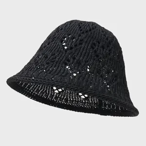 Black mesh knitted bucket hat detail, breathable hollow design for summer sun protection.