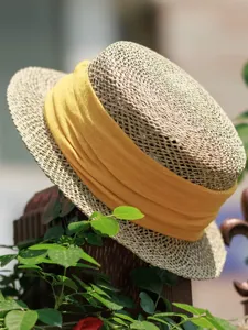 French vintage straw hat with yellow ribbon, hollow-out woven flat top sun hat for summer beach.