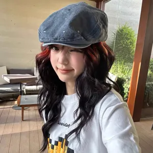 Vintage distressed grey flat cap with paint splatter detail, casual streetwear newsboy hat.