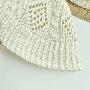 Detailed close-up of a white knitted hollow braided bucket hat with breathable diamond patterns.