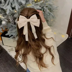 Elegant hair bow clip with long draped ribbons, sweet aesthetic back head spring clip accessory.