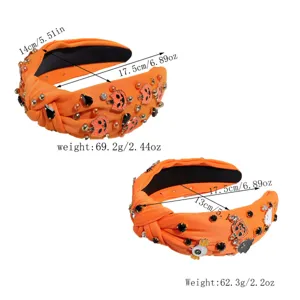 Halloween orange knotted headband with rhinestone pumpkin and ghost charms, detailed size view.