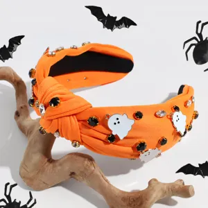 Halloween orange knotted fabric headband with cute ghost charms and sparkly rhinestones.
