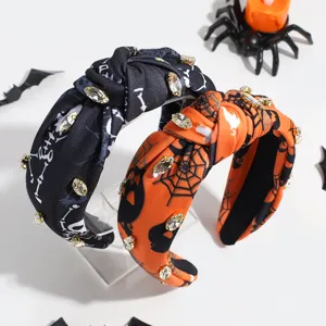 Rhinestone Halloween knotted headbands with skull and spiderweb prints, stylish hair accessories.