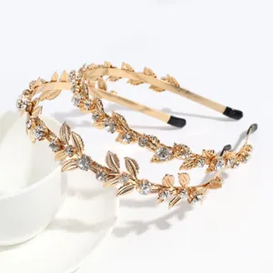 Diadema dorada de hojas con pedrería para mujeres, elegante accesorio de pelo fiesta.