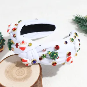 Christmas rhinestone knotted headband detail, featuring Santa Claus and tree charms for festive style.