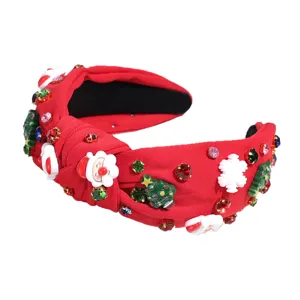 Red Christmas knotted headband with festive crystal rhinestones and cute holiday charms.