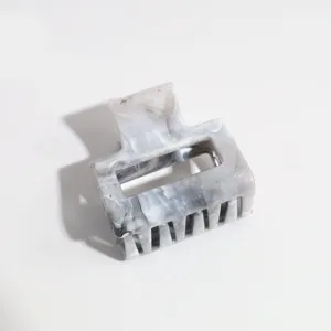 Small marble hair claw clip close up grey white acrylic hair accessory for women daily wear