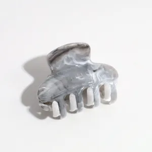 Grey marbled hair claw clip detail, small size acrylic hair accessory for half up hairstyles.