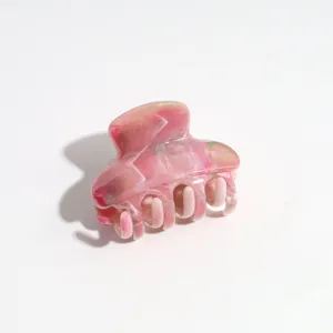 Small 4cm marbled hair claw clip pink resin cute hair accessory for half hairstyles.