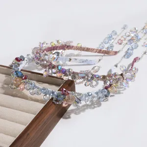 Serre-tête fleur en cristal perlé avec franges de glands, accessoire de cheveux élégant.