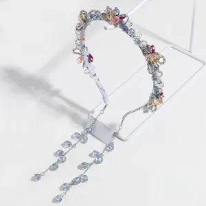 Serre-tête élégant en perles de cristal avec chaînes de glands suspendus pour femmes.