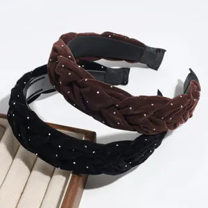 Velvet braided headband detail, sparkling rhinestone accents, elegant autumn hair accessory.