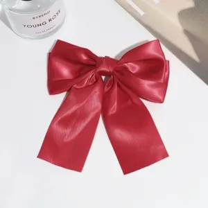 Red satin bow hair clip elegant ribbon hairpin vintage hair accessories for women chic.