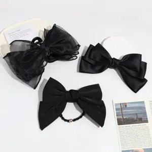 Black bow hair accessories set, elegant organza claw clip and ponytail hair tie for women.