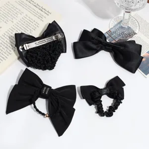 Black bow hair clip set, elegant satin hair accessories with net and scrunchie ponytail.