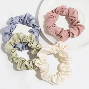 Set de chouchous en satin aux couleurs pastel, haute élasticité pour coiffure et queue de cheval.