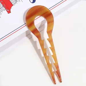 Acetat Schildpatt U-förmige Haargabel mit gezahnten Kanten für elegante Dutt-Stylingdetails.
