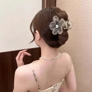 Detail shot of Korean style elegant mesh flower hair claw clip with sparkling rhinestones.