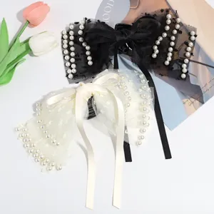 Elegant pearl mesh hair claw clip set, beautiful bow design for women and girls daily styling.