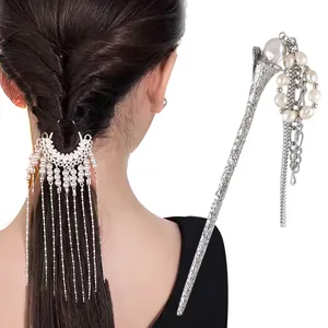 Detailed view of silver pearl hair pin and tassel hair accessory for elegant hairstyles.