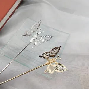 Elegant hollow butterfly hair stick detail, vintage metal hair pin for stylish buns and hair styling.