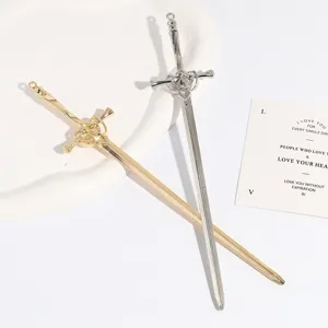 Detailed shot of medieval sword hair stick metal hair fork unique gothic bun pin accessory