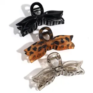 Set de pinzas para el cabello con lazo negro leopardo y gris transparente para mujeres.
