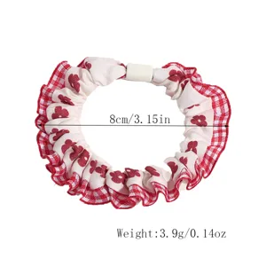 Red plaid heart print hair scrunchie with cute ruffle design and convenient clasp closure.