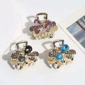 Elegant alloy mini hair claw clips with sparkling rhinestones, butterfly design, 3 pieces.