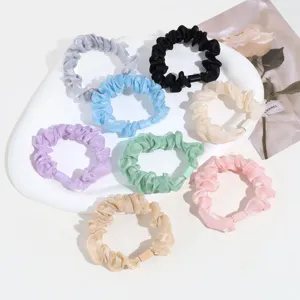 Lot de chouchous en velours coloré élastiques cheveux pour femmes queue de cheval.