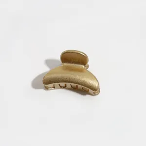 Gold glitter mini hair claw clip sweet heart hair accessory for bangs side hair styling.