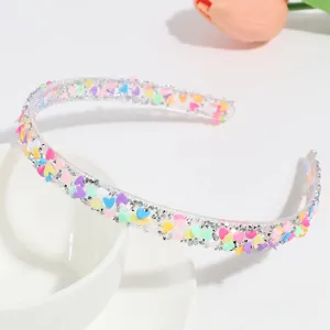 Transparent plastic headband with colorful candy hearts and rhinestones for daily sweet fashion wear.