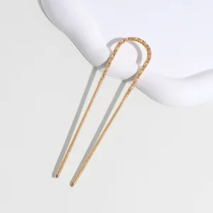 Gold carved U-shaped hair fork detail, elegant metal hairpin for daily hair styling and buns.