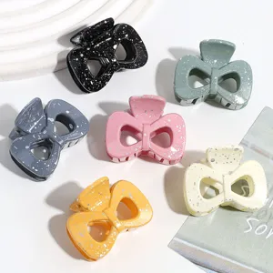 Detailed view of Morandi color bow hair claw clips with speckle design, elegant and durable.