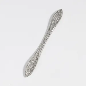 Silver rhinestone hair fork detail featuring sparkling crystals and elegant hollow wave design.