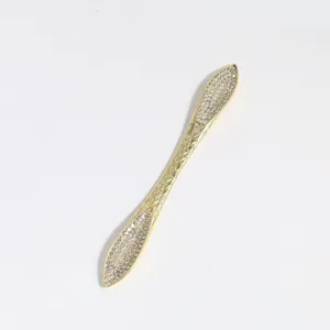 Exquisite gold rhinestone hair stick detail, elegant crystal hairpin for chic bun styling.