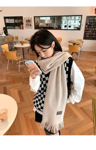 Cozy beige knit scarf for women, long winter warm casual neckerchief with stylish tassels.