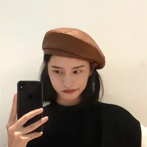 Brown PU leather beret detail shot, classic vintage style hat for women, stylish daily wear accessory.