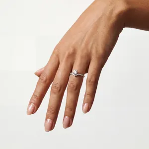 Detailed close-up shot showcasing the elegant V-shaped lab-grown diamond sterling silver ring worn.