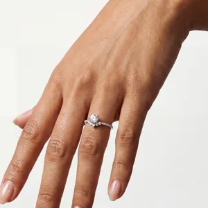 Close-up detail of the elegant V-shaped lab-grown diamond sterling silver ring worn on hand.