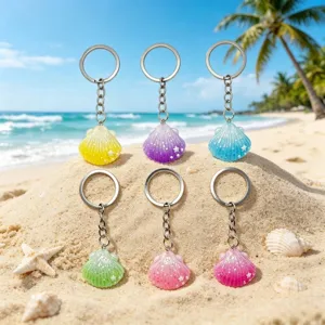 Closeup details of colorful resin seashell keychains with metal rings for bags and car decor.