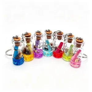 Miniature glass wishing bottle keychain detail, colorful drift bottles with tiny shells and scrolls.