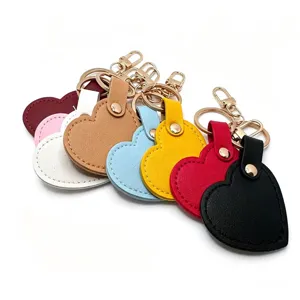 Colorful leather heart keychain, stylish DIY bag charm and cute keyring accessory for daily use.