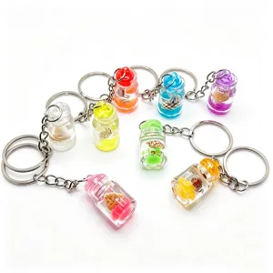 Miniature drifting bottle keychains with colorful shells and cute ocean elements for keys.