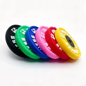Colorful mini barbell plate charm detail, vibrant fitness pendant for backpack decoration.